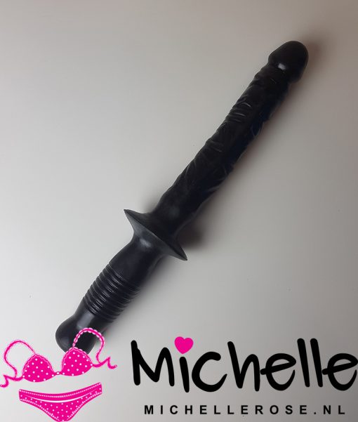 Gebruikte dildo met handvat