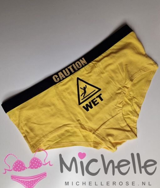 CAUTION WET – gele hipster